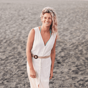 Woman on beach wearing linen