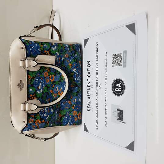 Buy the AUTHENTICATED Coach Blue Floral Leather Hand Held Crossbody Bag