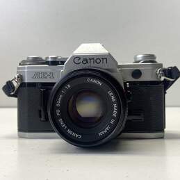 Canon AE-1 35mm SLR Camera with Lens