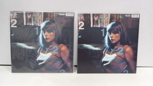 Pair of Taylor Swift Moonstones Midnight Blue Edition Vinyl Records image number 2