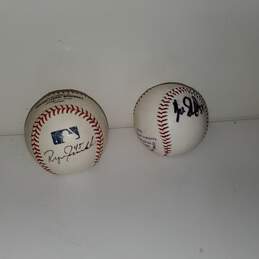 Pair of Signed Baseballs by Players #45 and 52 alternative image