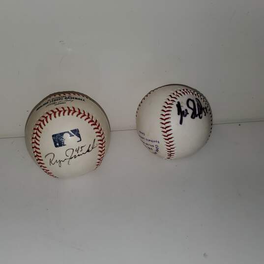 Pair of Signed Baseballs by Players #45 and 52 image number 2