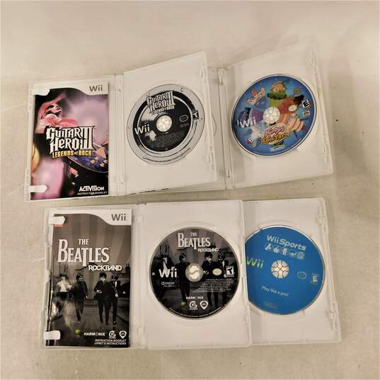 Nintendo Wii in original box w/4 Games and the Beetles Rock band image number 11