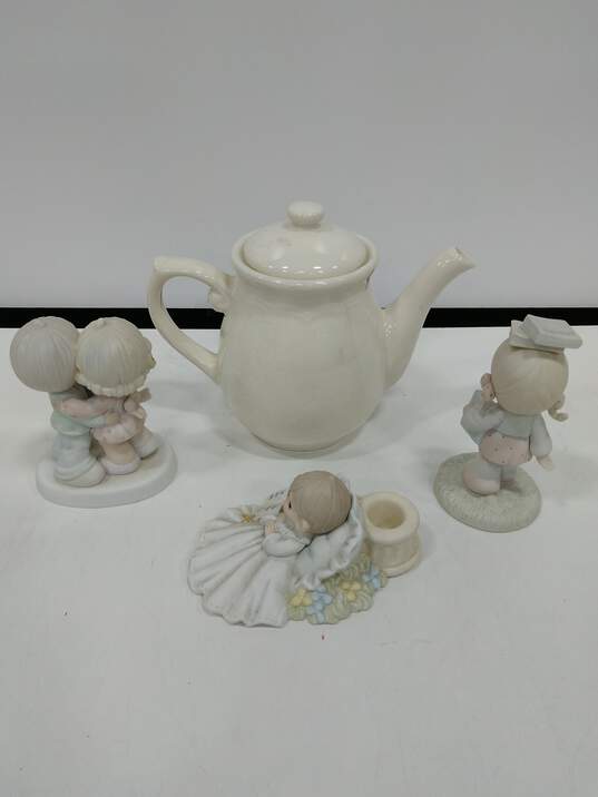 Bundle of Four Precious Moments Figurines image number 3