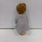 MME Alexander Blonde In Patterned Coat Baby Doll image number 2