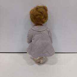 MME Alexander Blonde In Patterned Coat Baby Doll alternative image