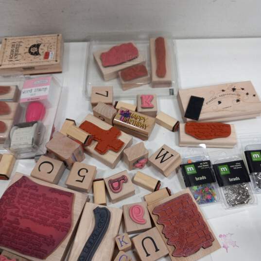 Bundle of Assorted Wooden Rubber Stamps & Craft Brads image number 4