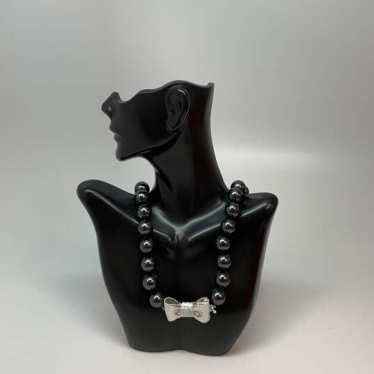 Designer Kate Spade Silver-Tone Black Beaded Bow Shape Pendant Necklace image number 1