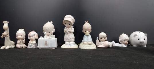 Bundle of 9 Assorted Precious Moments Figurines image number 1