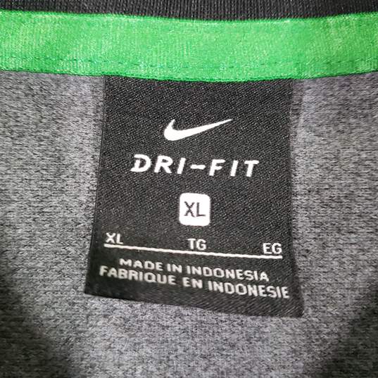 Mens Dri-Fit Oregon Ducks 1/4 Zip Long Sleeve Basketball Sweatshirt Size XL image number 4
