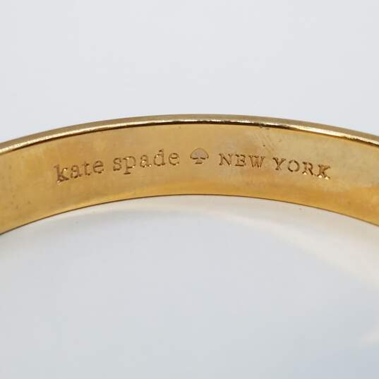 Kate Spade - New York Gold Tone Enamel 2 1/2 Bangle Bracelet 30.8g image number 4