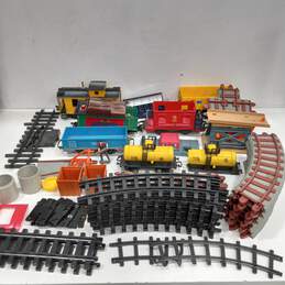 Bundle of Assorted Plastic Train Cars, Tracks & Structures