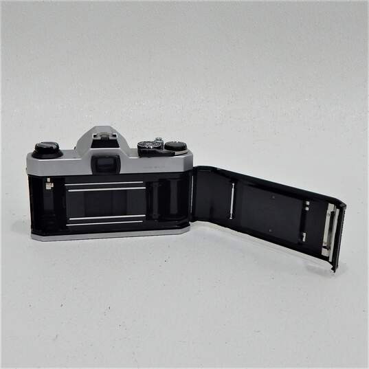 Pentax K1000 SLR 35mm Film Camera W/ Lenses Flash Manuals Case image number 8