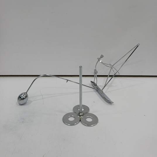 Kinetic Balancing Metal Art of Figure image number 1