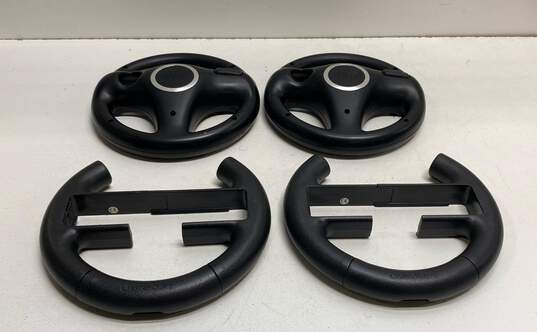 Nintendo Wii steering wheels - Lot of 4, mixed image number 1