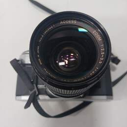 Canon AE-1 SLR 35mm Film Camera w/ Lens & Case alternative image