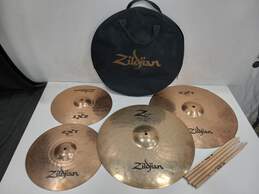 Bundle of 4 Zildjian Ride Cymbals And 5 Drumsticks In Case