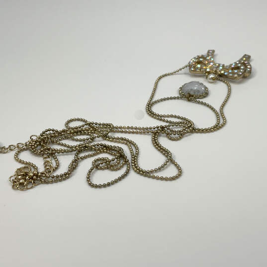 Designer Betsey Johnson Gold-Tone 2 Strand Rhinestone Bow Pendant Necklace image number 2