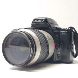 Minolta Maxxum 3xi 35mm SLR Camera with Lens