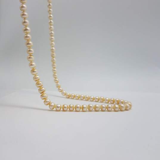 IPS 14k Gold Knotted 6.5mm Fw Pearl 64 Inch Necklace 97.0g image number 7