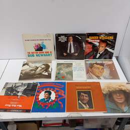 Bundle Of 10 Assorted Vinyl Records In Sleeves