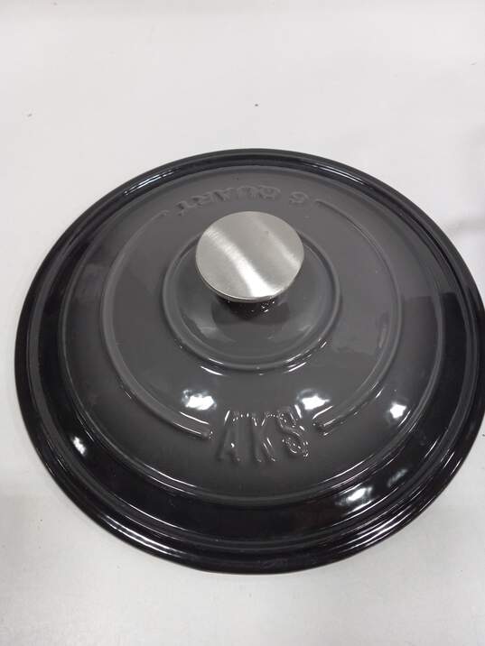Sold at auction Two Miniature Cast Iron Pots and a Miniature Dutch Oven  Auction Number 2744M Lot Number 63