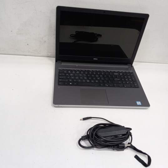 Dell Laptop with Power Adaptor image number 1