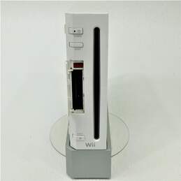 Nintendo Wii With 4 Games, 2 Controllers, 2 Nunchucks, and 1 Stand alternative image