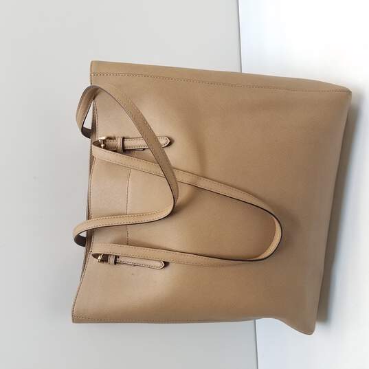 Buy the Michael Kors Tan Canvas Tote Bag