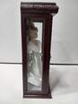 VINTAGE 2000 CAMELLIA GARDENS COLLECTION 16" PORCELAIN DOLL IN WOOD AND GLASS CASE WITH SWAROVSKI COMPANY NECKLACE AND EARRINGS image number 6