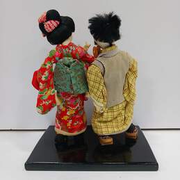 Vintage Boy & Girl Dolls in Kimono on Wooden Base alternative image