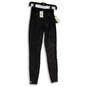 NWT Womens Black Faux Leather Flat Front Skinny Leg Ankle Pants Size 0 image number 1