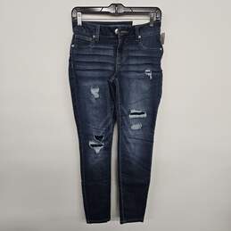 Distressed Dark Denim Mid Rise Jegging Jeans
