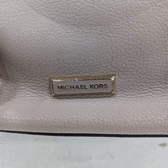 Michael Kors Pale Pink Crossbody Bag with Tassels image number 3