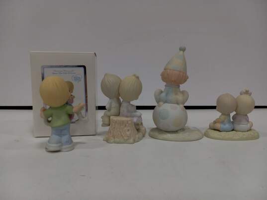 4 Precious Moments Figurines image number 4