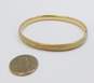 14K Gold Lattice Etched Textured Puffed Oval Hinged Bangle Bracelet 8.1g image number 3