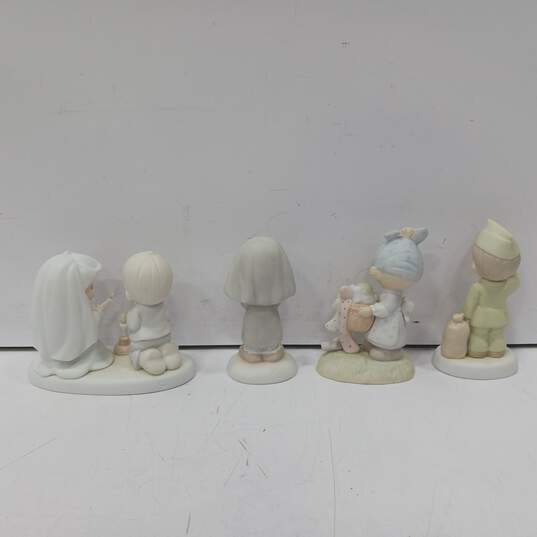 4 Assorted Precious Moments Figurines image number 2