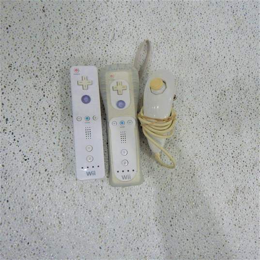 Nintendo Wii W/ Two Games, Two Controllers, 1 Nunchuck Cars image number 7