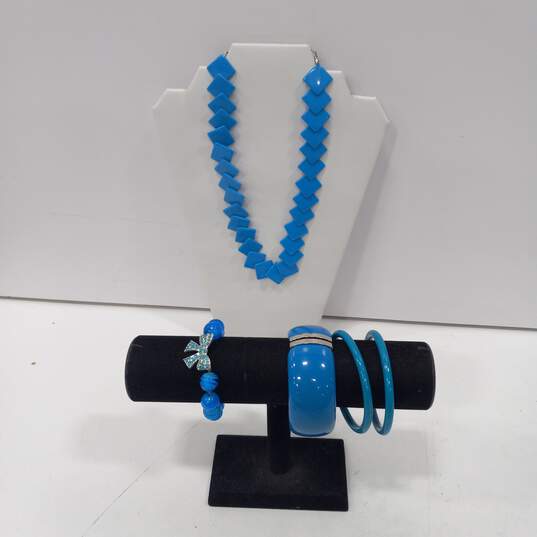 Bundle of Assorted Blue Themed Fashion Jewelry image number 1