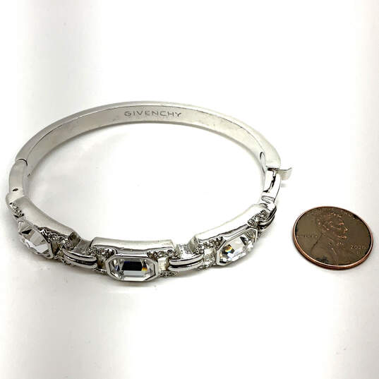 Designer Givenchy Silver-Tone Clear Crystal Stone Hinged Bangle Bracelet image number 2