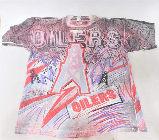 Buy the Vintage Magic Johnson Houston Oilers NFL T-shirt Size