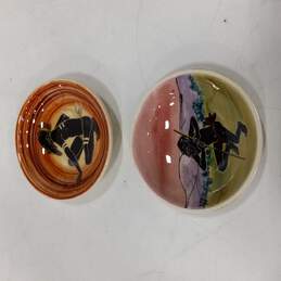 Pair of 2 Ceramic Saucers