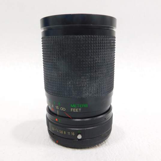 Canon AE-1 Program 35mm Film Camera w/ 3 Lens, Lens Converter, Flash & Bag image number 19