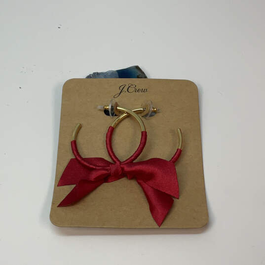 Designer J. Crew Gold-Tone Red Ribbon Wrapped Fashionable Hoop Earrings image number 1