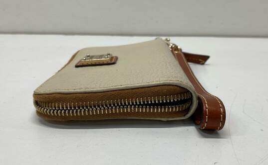 Dooney & Bourke Tan Leather Zip Around Card Wristlet Wallet image number 3