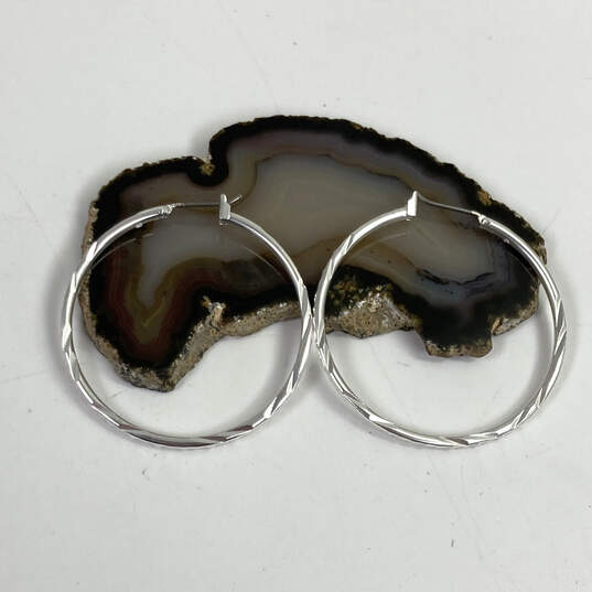 Designer Lucky Brand Silver-Tone Cut Round Shape Fashionable Hoop Earrings image number 1