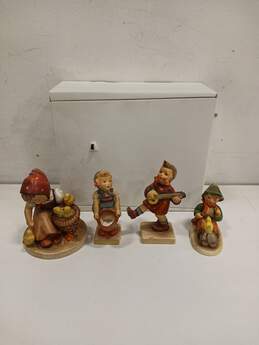 4 Vintage Hummel Collectible Figurines