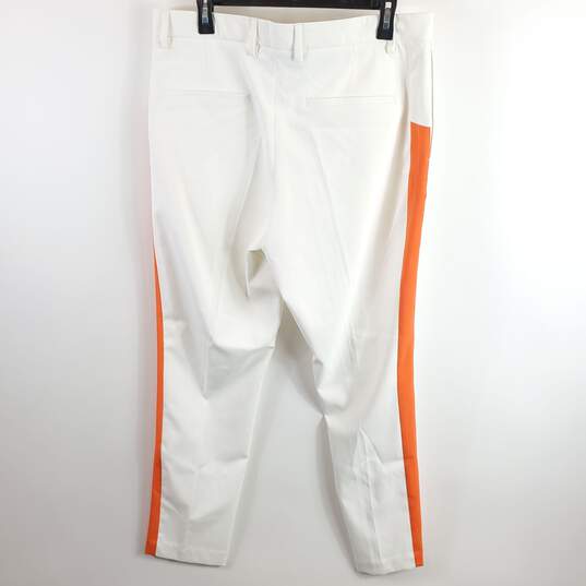 J. Lindeberg Men White/ Orange Striped Golf Pants Sz 33 image number 2