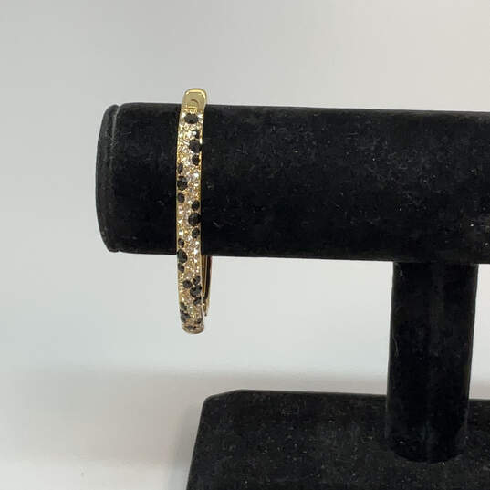 Designer Swarovski Gold-Tone Clear & Black Crystals Hinged Bangle Bracelet image number 1