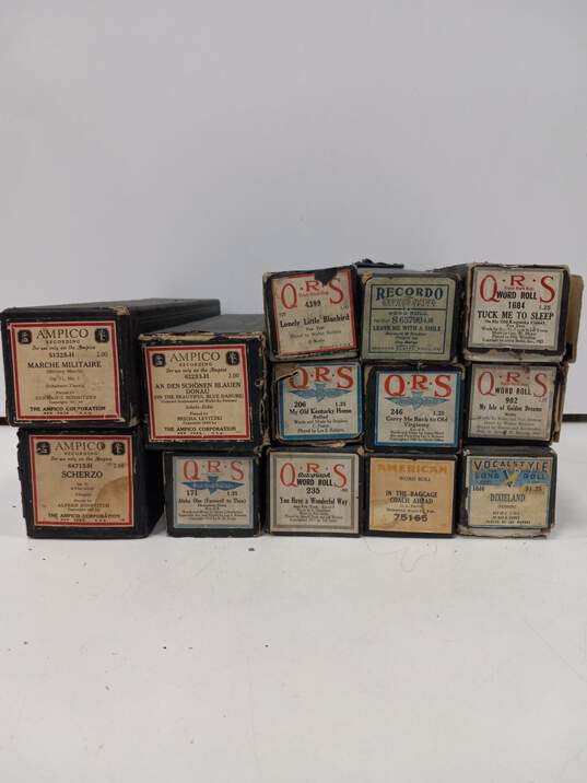 Bundle of 13 Assorted Vintage Piano Rolls in Boxes image number 1